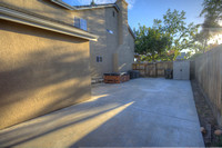 side yard with concrete